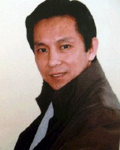 何家英